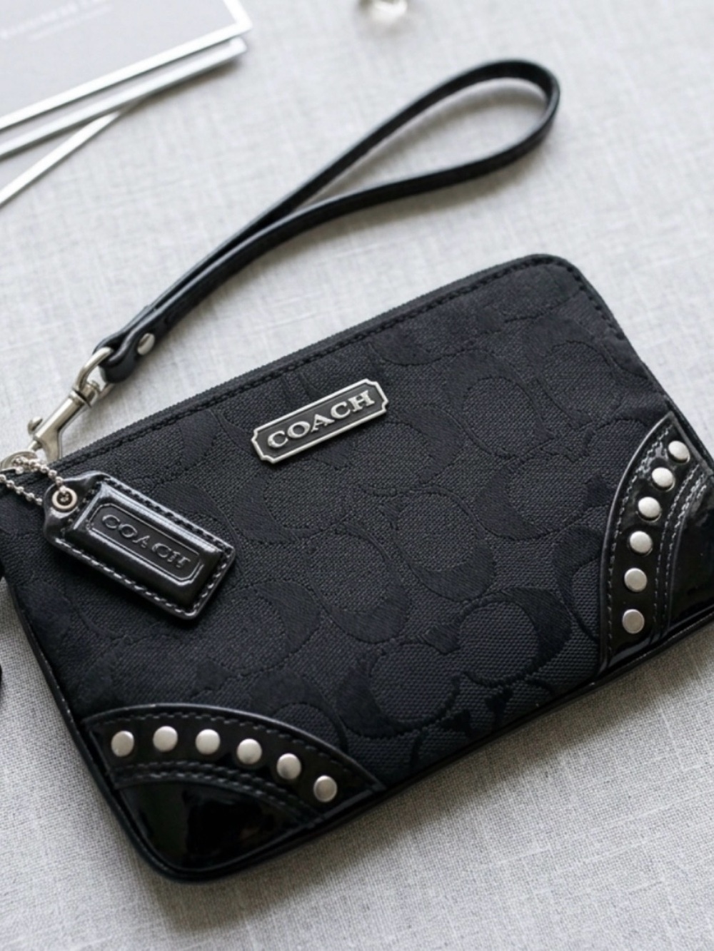 Coach vintage Black Signature Wristlet with Studded Trim and gunmetal hangtag